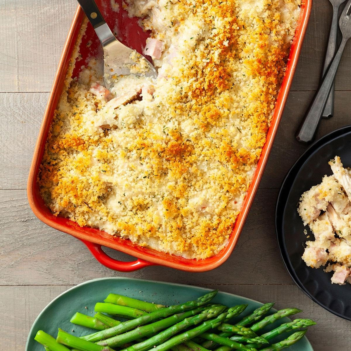 Chicken Cordon Bleu Casserole, a creamy casserole with breadcrumb topping in a baking dish.