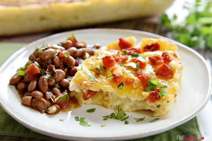 King Ranch Chicken Casserole on plate with cilantro garnish.