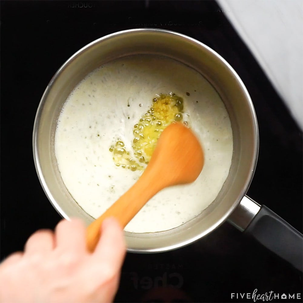 Starting homemade sauce in pot with butter and garlic.