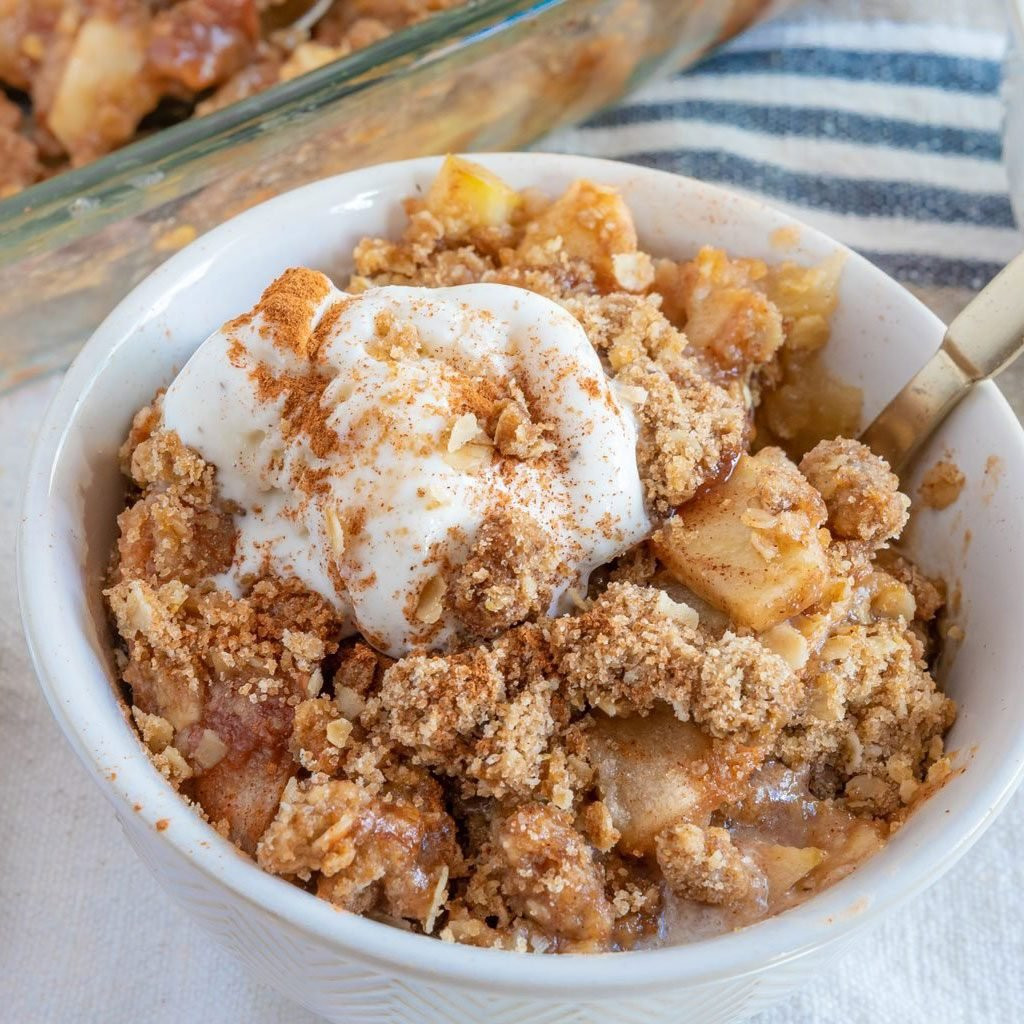 Close up of Pioneer Woman Apple Crisp in a baking dish, showing the golden brown topping.