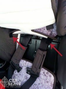 Britax Pioneer cover change process highlighted with arrows, showing the ease of swapping covers without uninstalling the seat