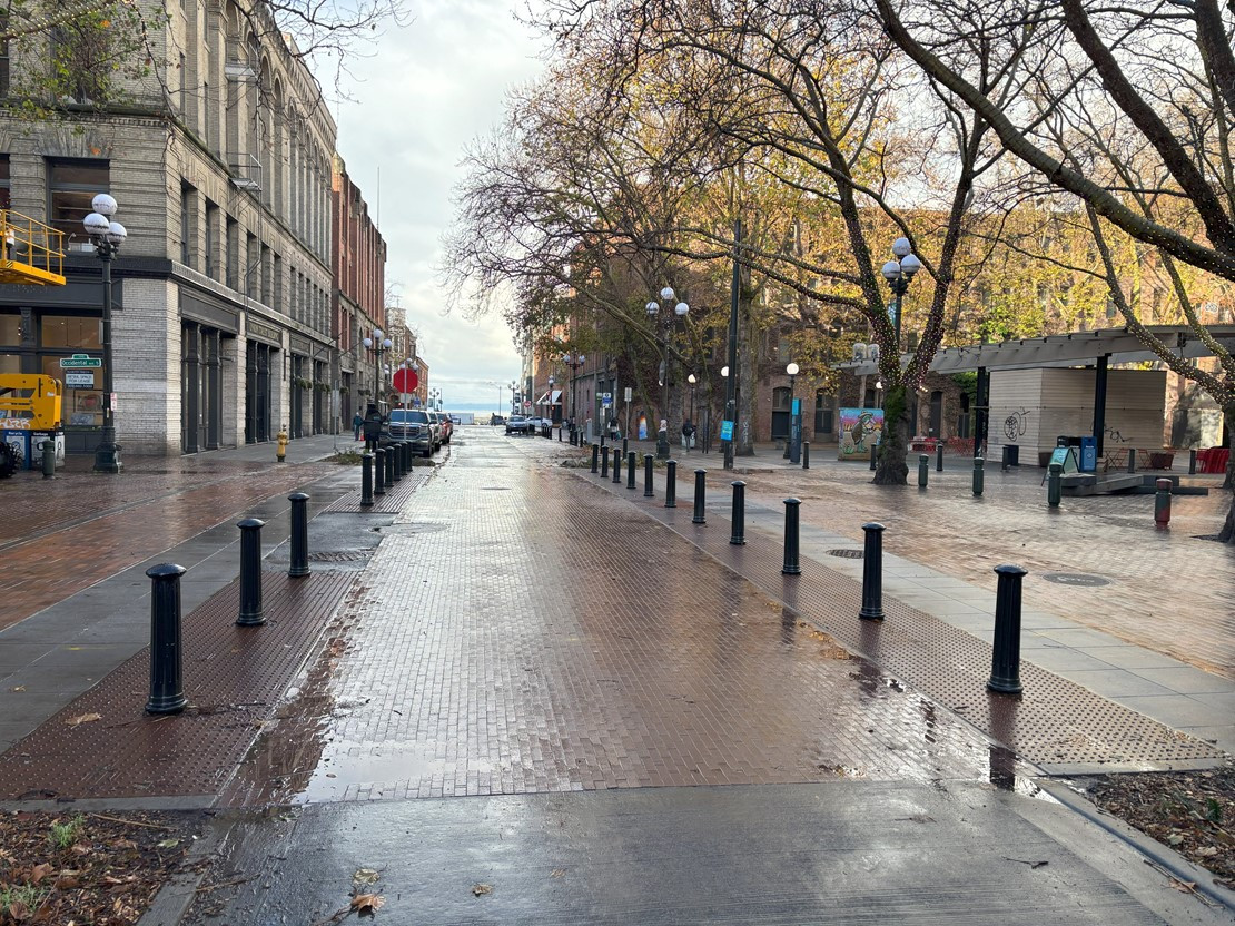 Photo depicting the completed improvements on S Main St at Occidental Park in Pioneer Square South, emphasizing pedestrian-friendly design.