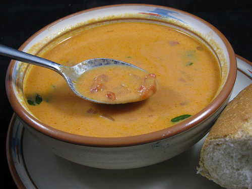 Pioneer Woman Sherried Tomato Soup in a bowl, garnished with herbs