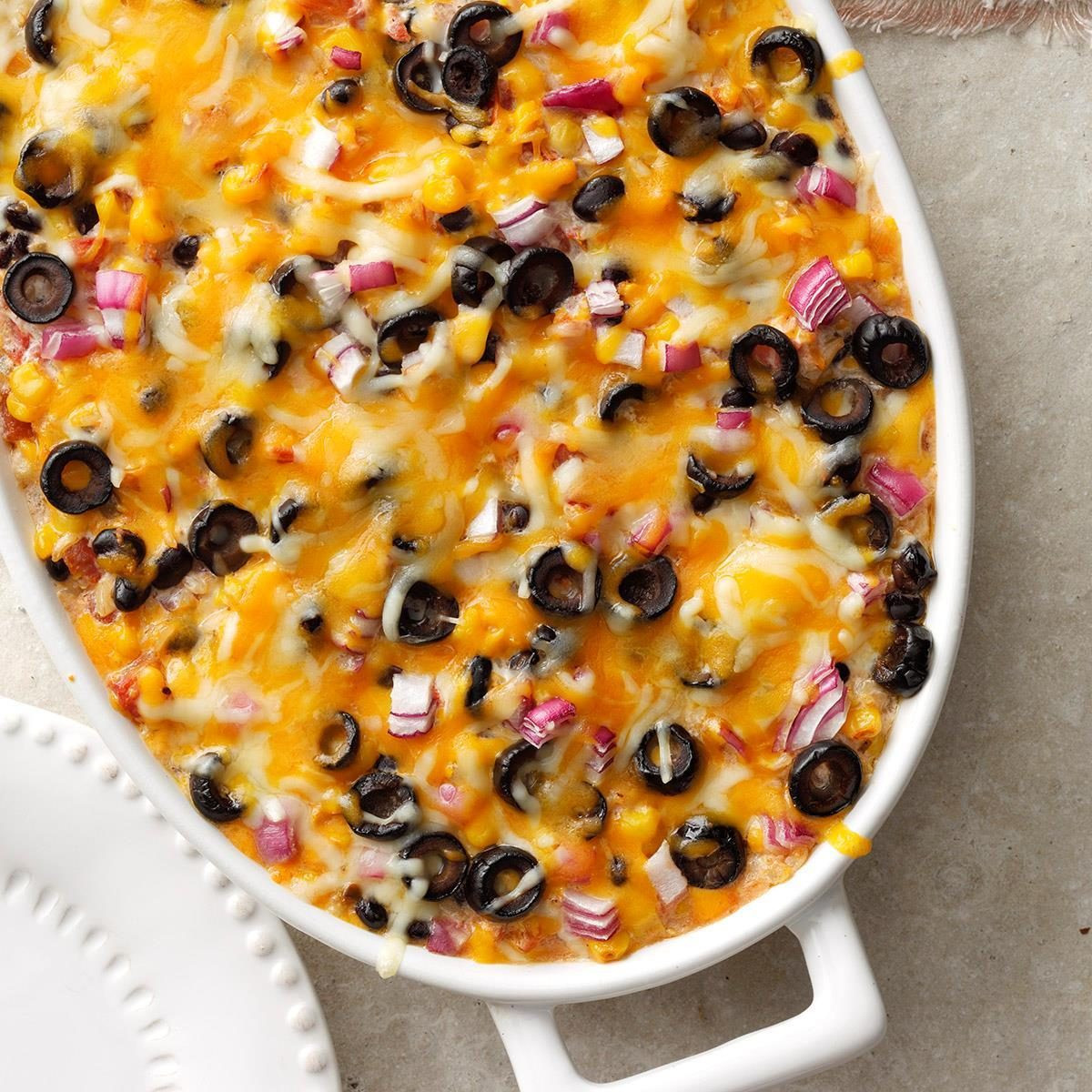 Southwest Vegetarian Bake, a vegetarian casserole with corn, beans, and cheese in a baking dish.