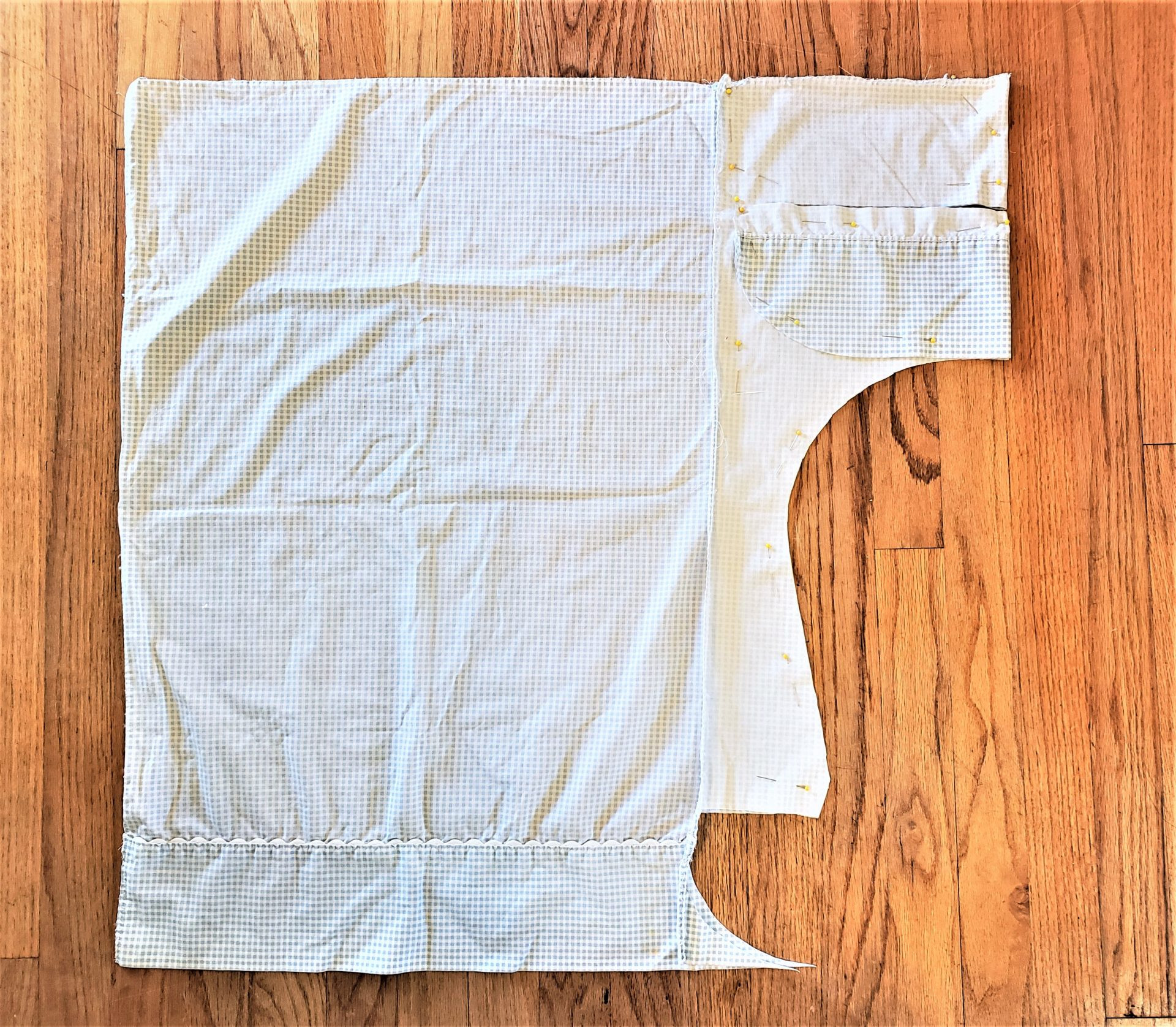 Cut fabric pieces for the pioneer bonnet, including brim, crown, and ties