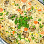Creamy chicken and wild rice soup in a dutch oven
