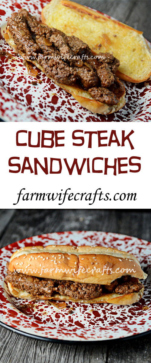 A finished cube steak sandwich on a plate, ready to be served, highlighting its appetizing appearance.