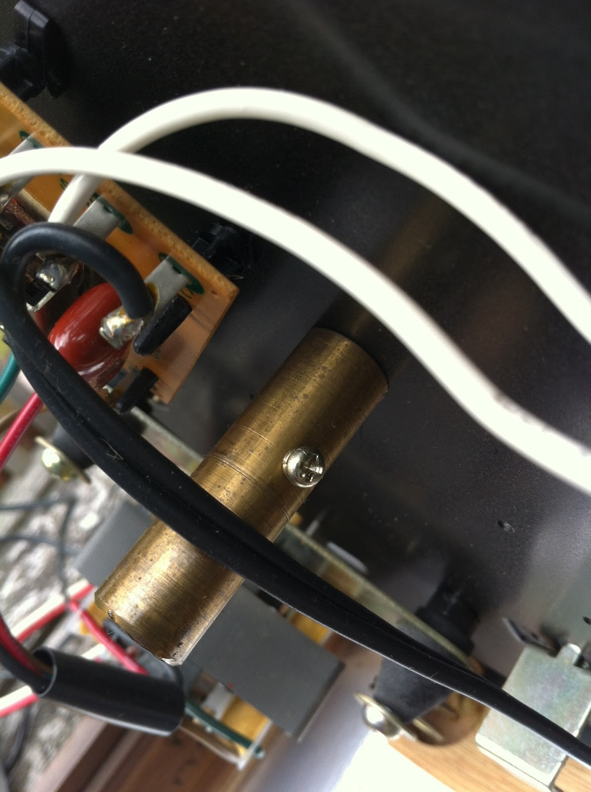 Underside of Pioneer PL-12D top plate, showing motor mounting points and main bearing well.