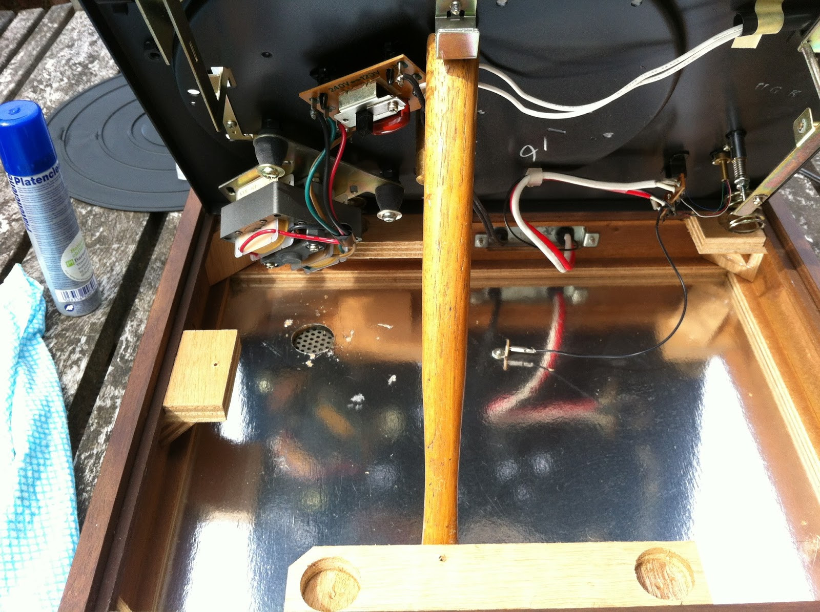 Close-up of a Pioneer PL-12D suspension spring and foam damper, showing the spring mechanism.