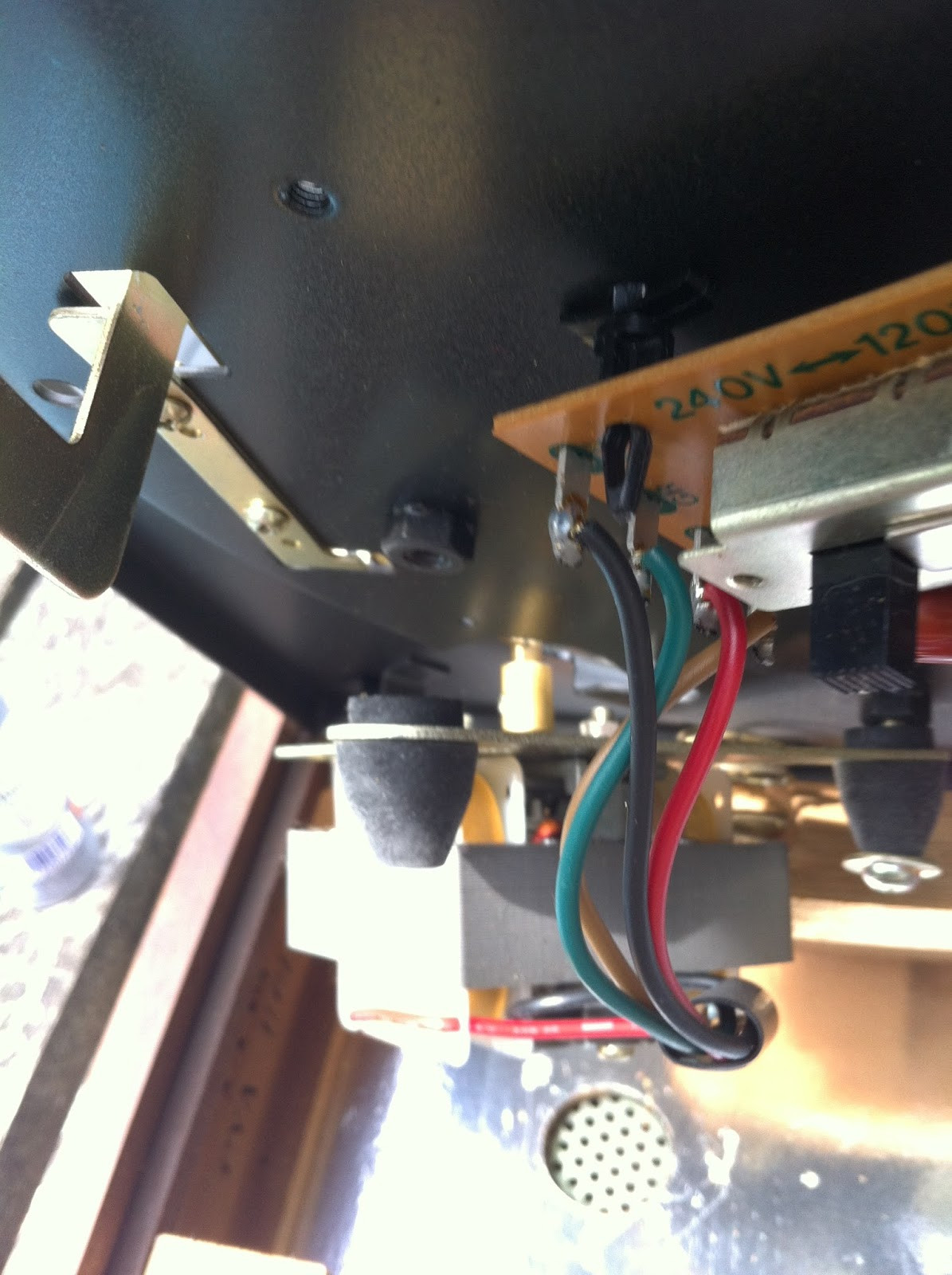 Pioneer PL-12D motor with one mounting rod removed, showing accessibility for servicing.