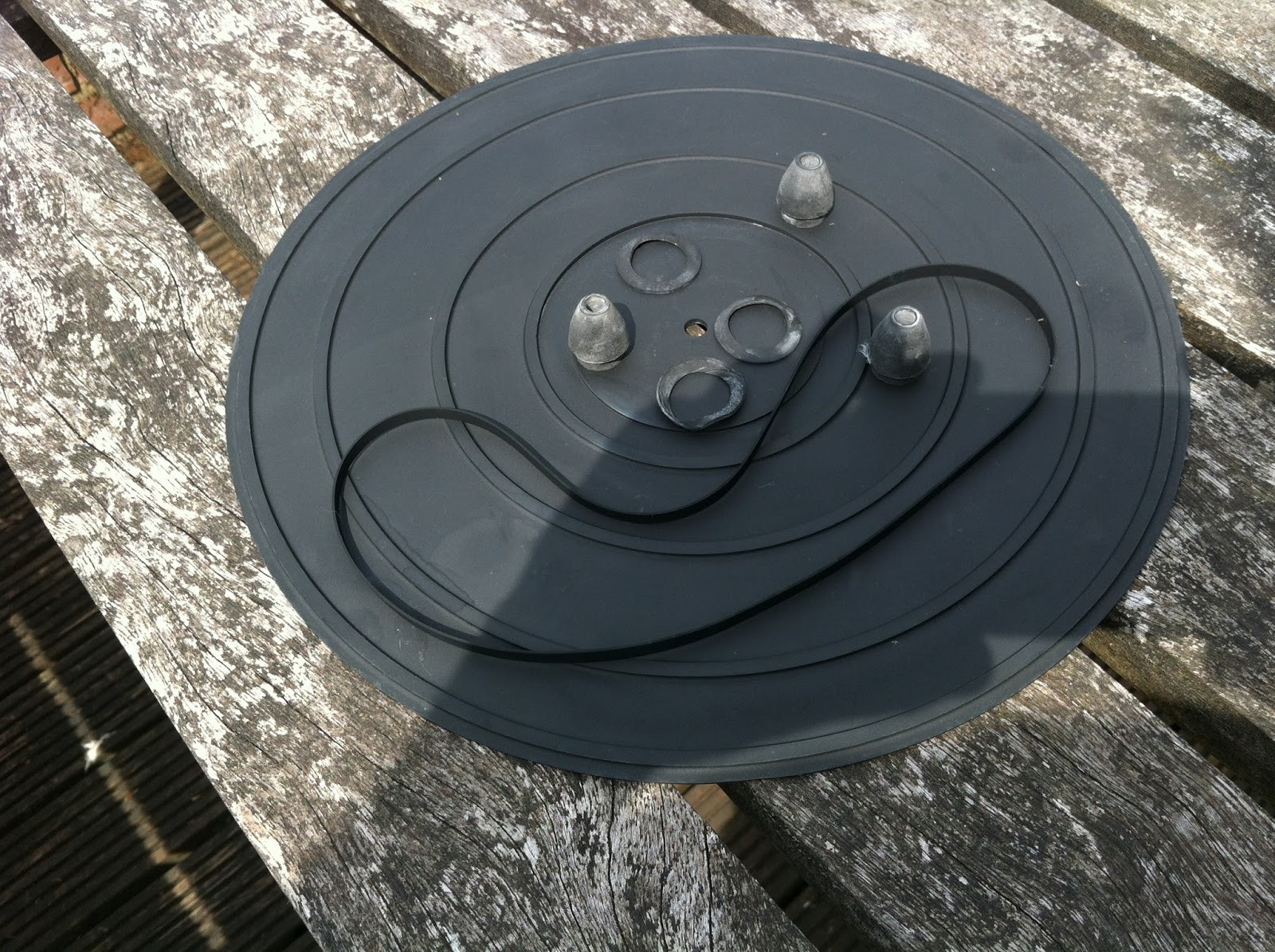 Pioneer PL-12D spindle shaft being cleaned with Servisol and a soft cloth.