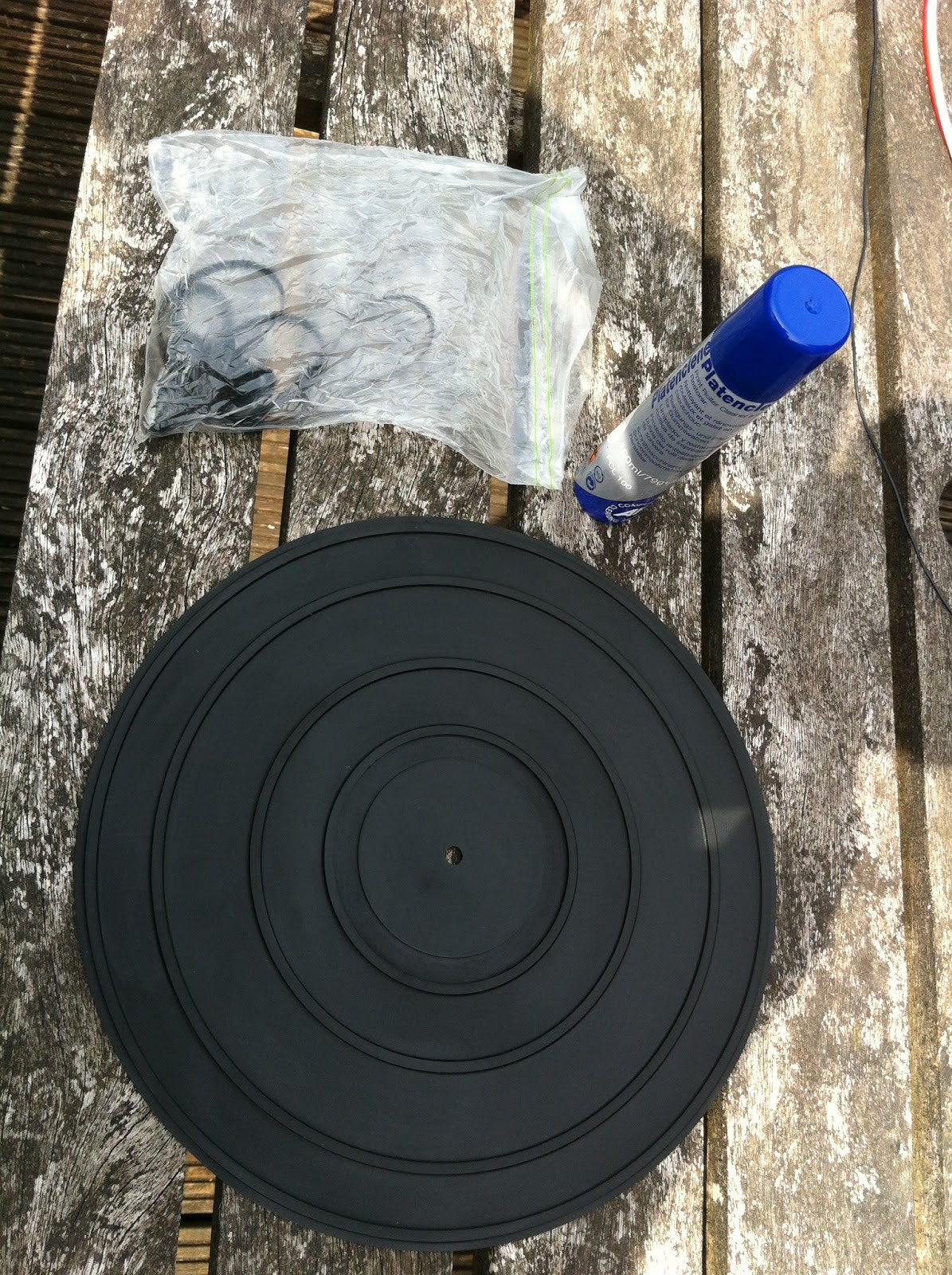Pioneer PL-12D rubber components being treated with Platenclene roller restorer in a plastic bag.