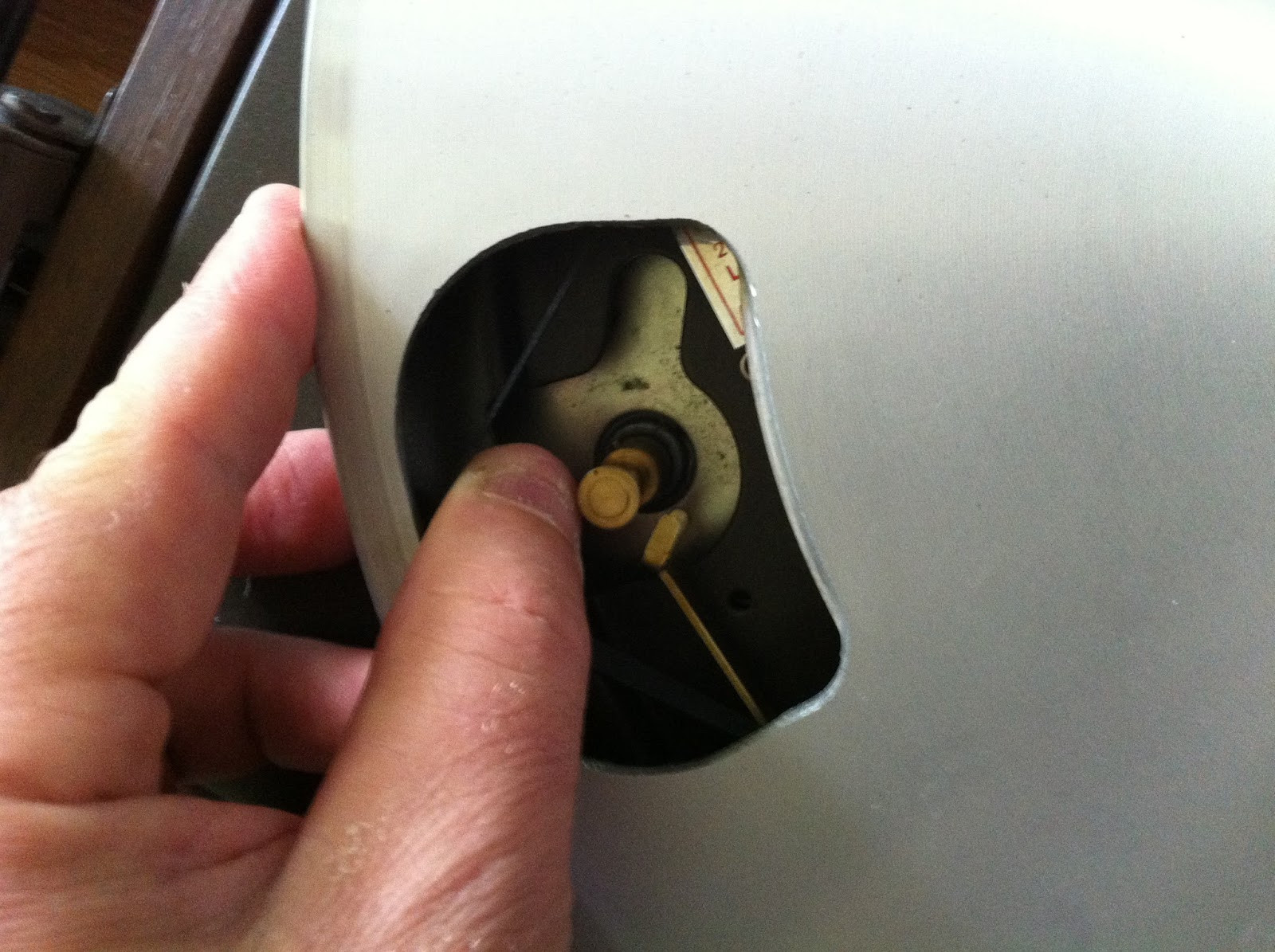 Pioneer PL-12D platter removed, revealing the access holes and underlying components.