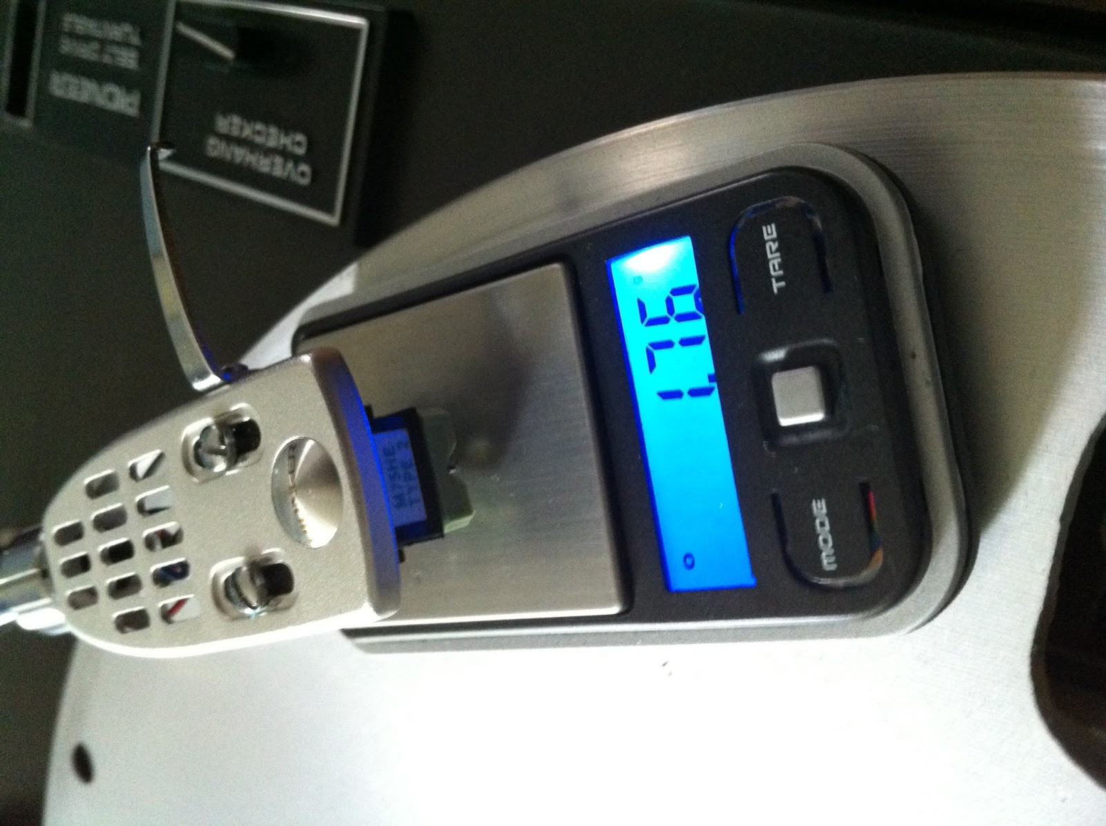 Pioneer PL-12D tonearm balance weight and adjustment collar, showing zero setting for balancing.