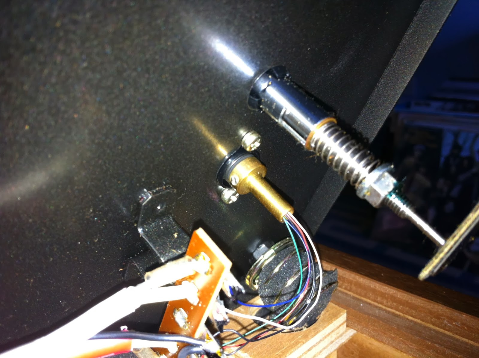Pioneer PL-12D tonearm bearing housing, showing brass tube and collar for bearing adjustment.