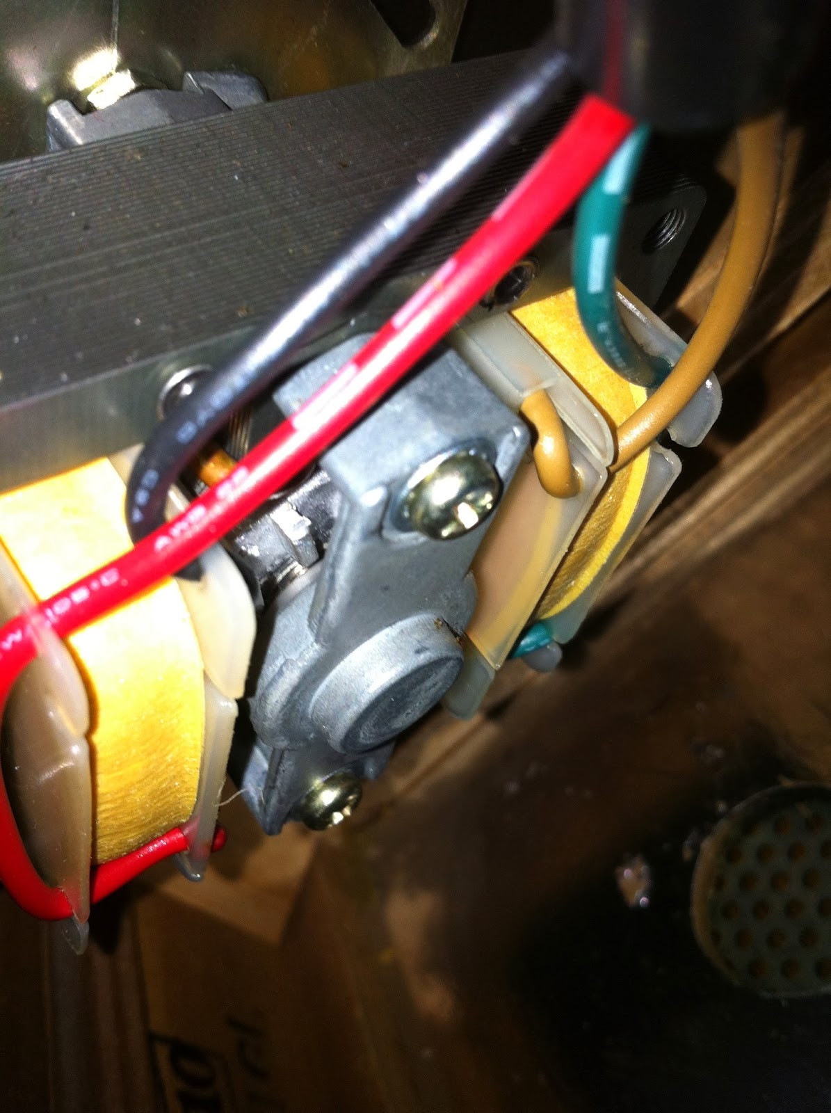 Side view of Pioneer PL-12D motor, showing fan and potential lower bearing access point.
