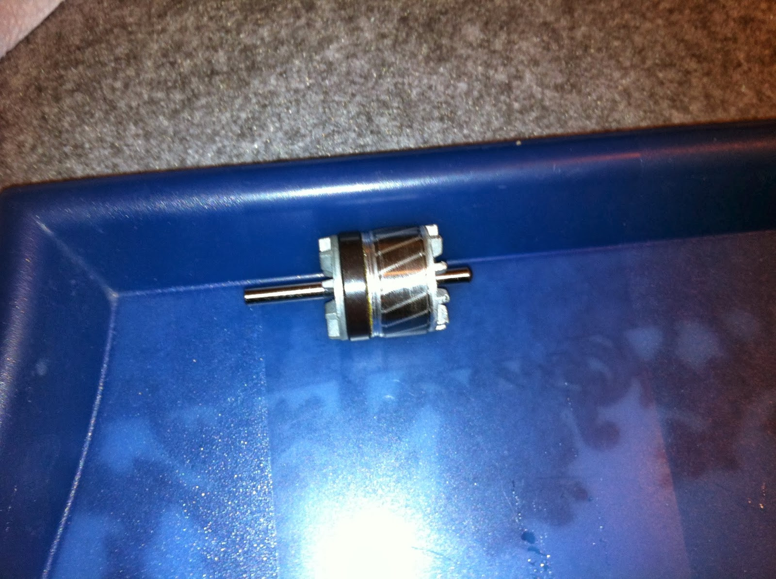 Pioneer PL-12D motor stator, rotor, and bearing frames separated after disassembly.