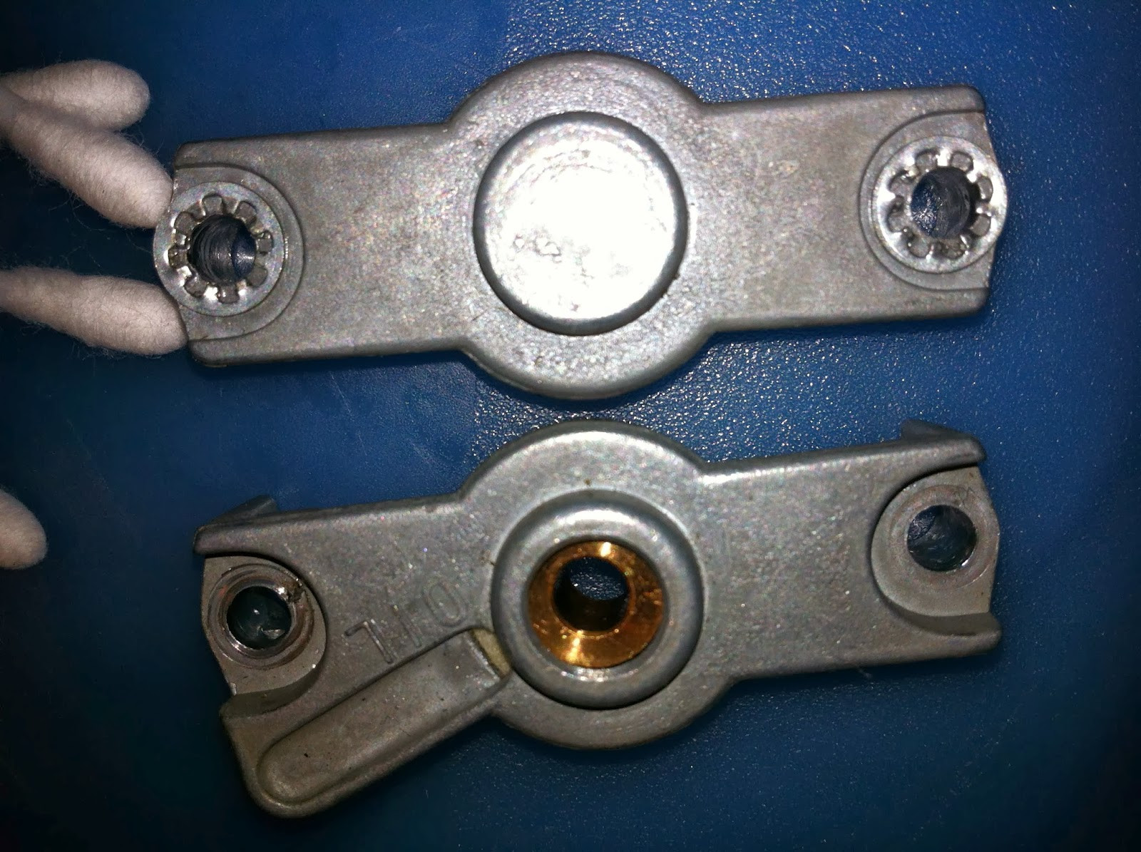 Pioneer PL-12D lower motor bearing frame interior, showing bronze bearing and cleaning process.