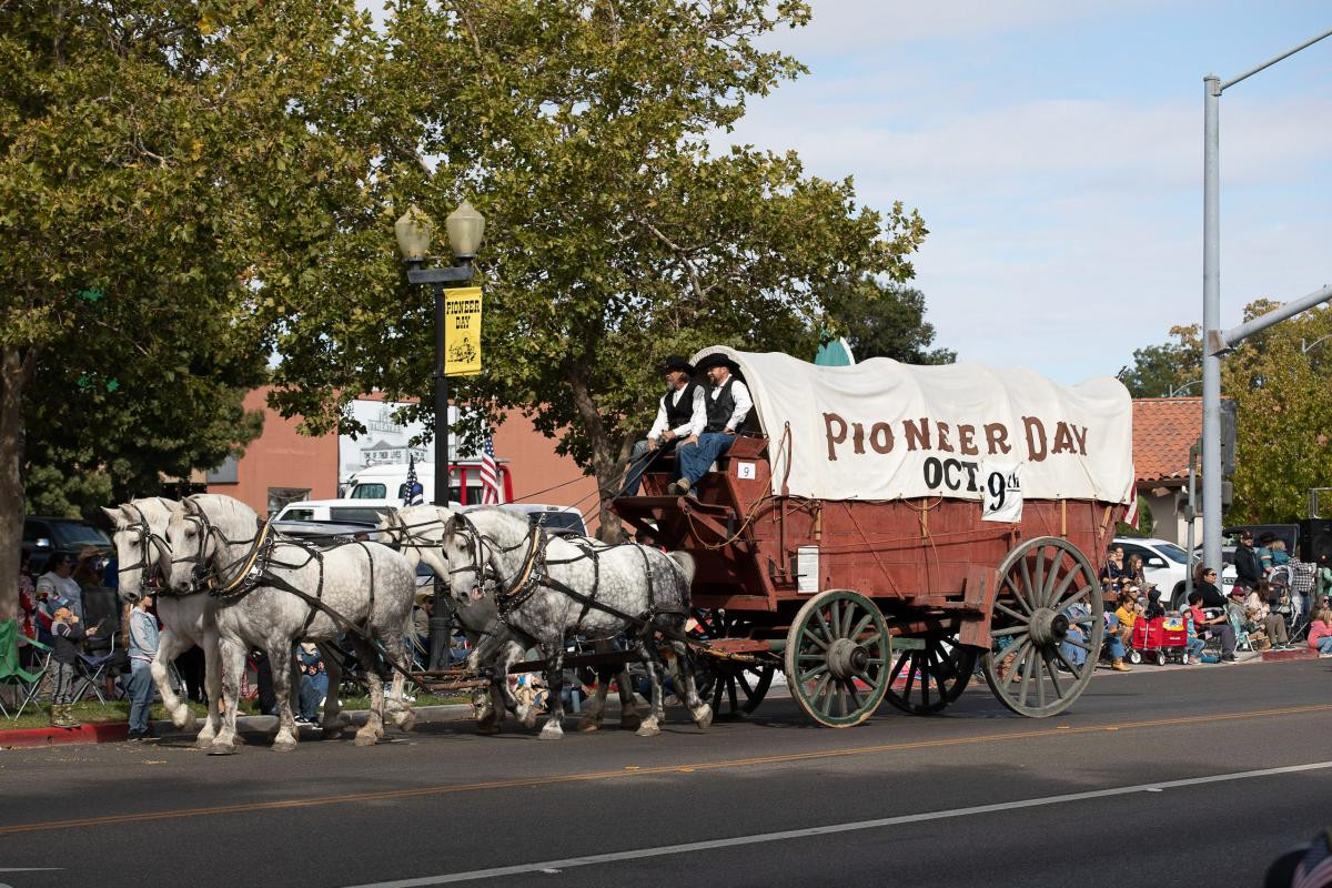 Experience the Pioneer Day Paso Robles 2024 parade featuring a horse-drawn covered wagon, a highlight of this annual old west celebration.