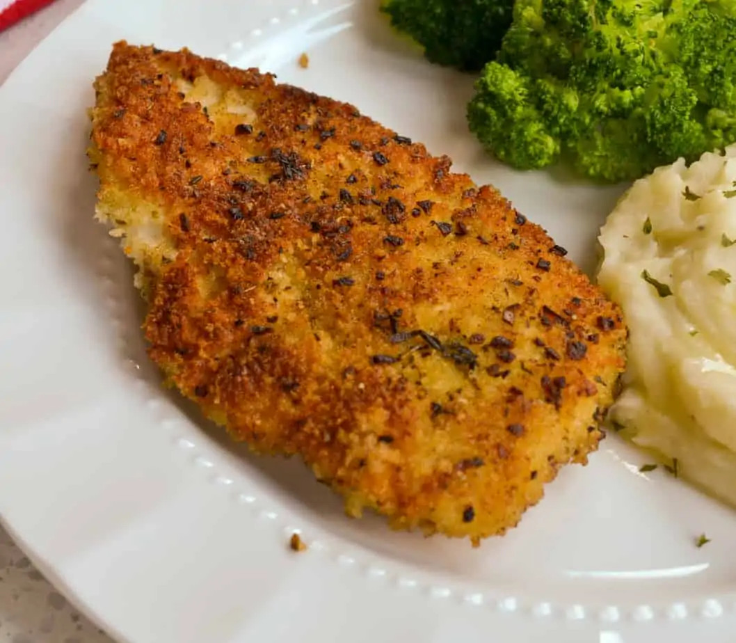 Parmesan crusted chicken recipe card image.