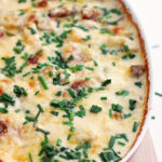 Potatoes au gratin loaded with cheese, cream and garlic. An easy no fuss no mess delicious weeknight meal. (and the perfect side dish to your holiday meal)