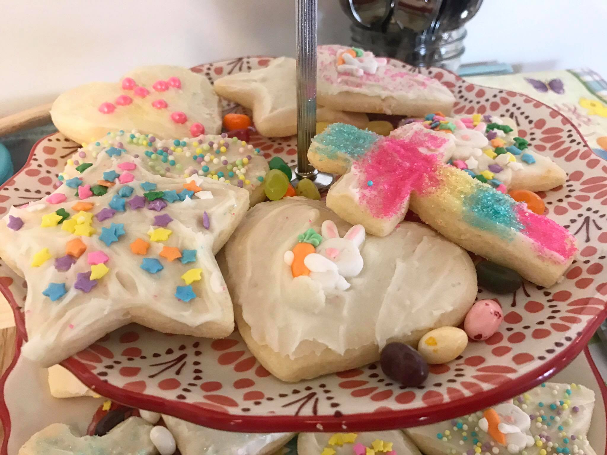 Close-up of decorated sugar cookies on a serving tray