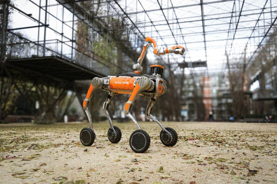 Swiss-Mile's autonomous robot navigating a Zurich street, showcasing its delivery capabilities